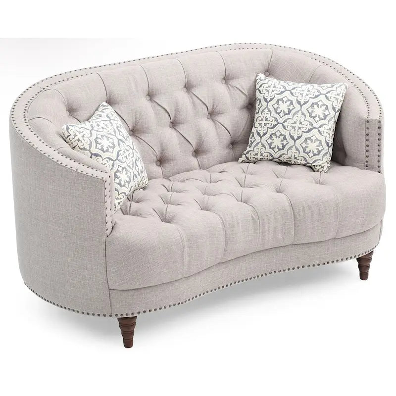 Causeuse en tissu touffeté