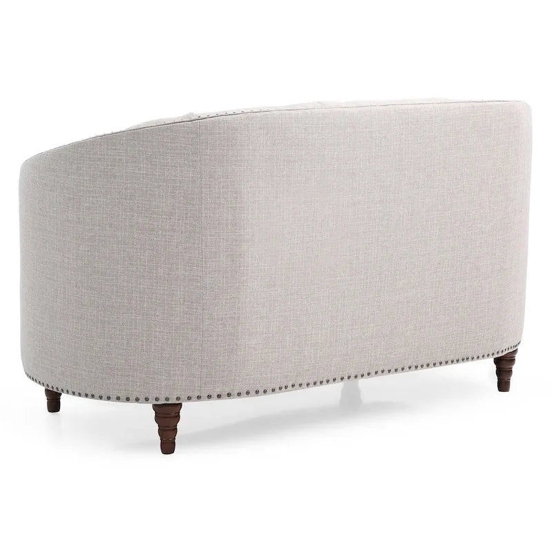 Causeuse en tissu touffeté